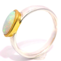 Ring with precious opal set in 18k gold frame